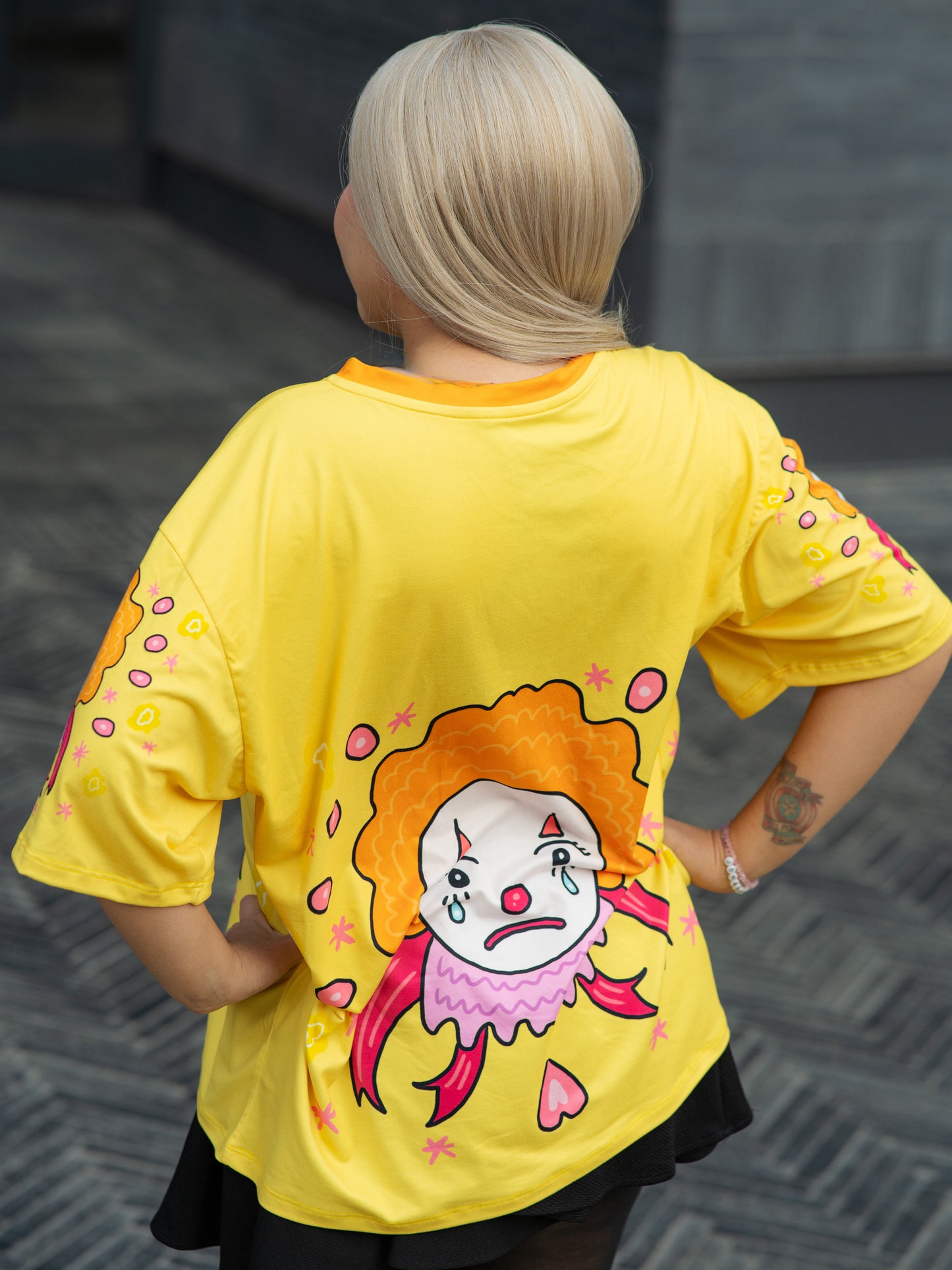Polera oversize payaso triste